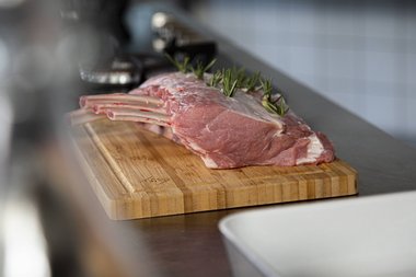 Frenched rack veal with fresh herbs and garlic.