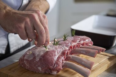 Fill the notches with fresh herbs and garlic.