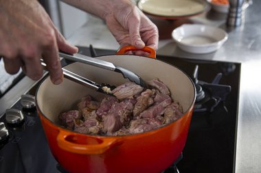 Fry the veal for about 5 minutes.