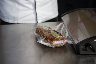 Vacuum the veal with herbs and spices.